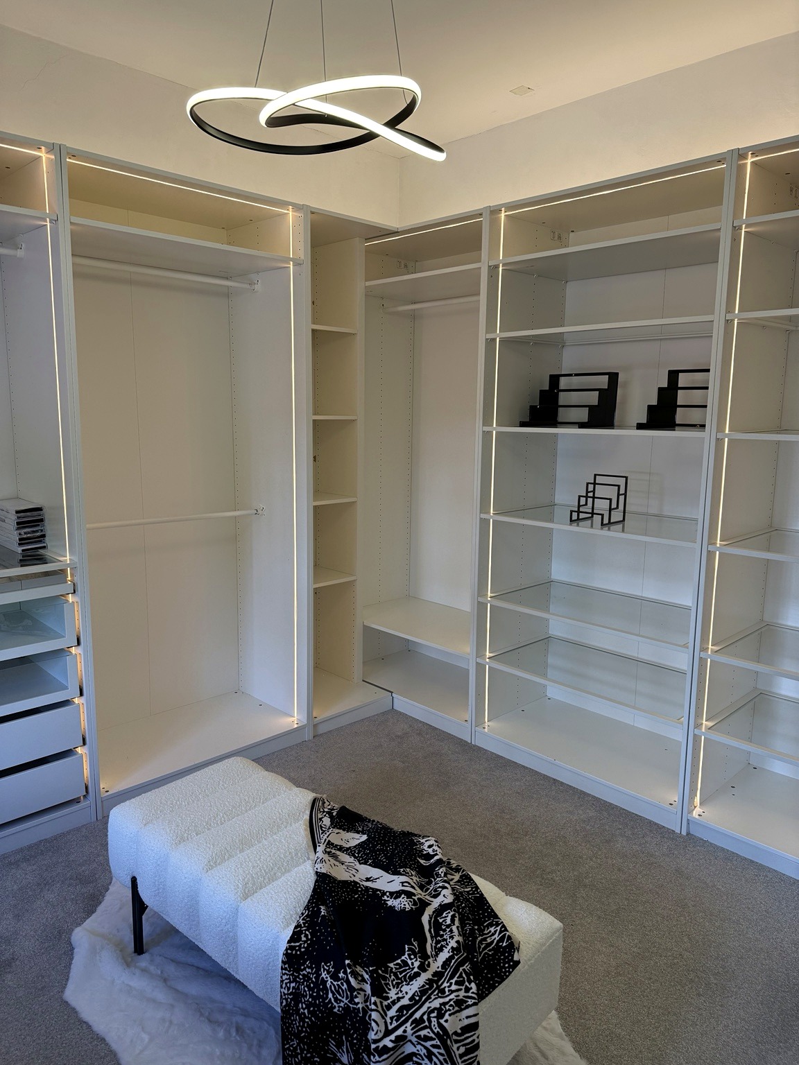 Bespoke full-wall storage with integrated lighting