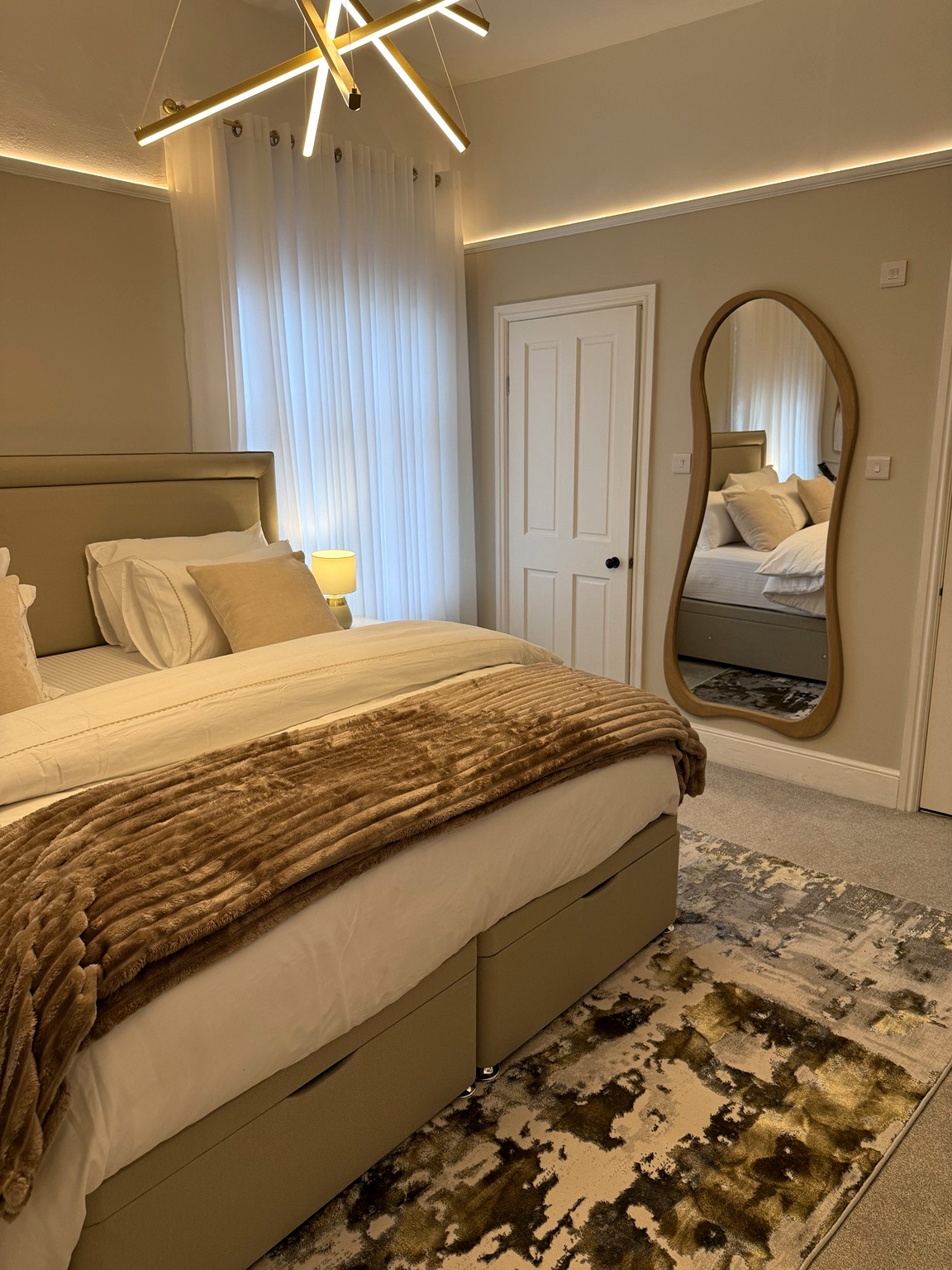 Bedroom feature wall and television area