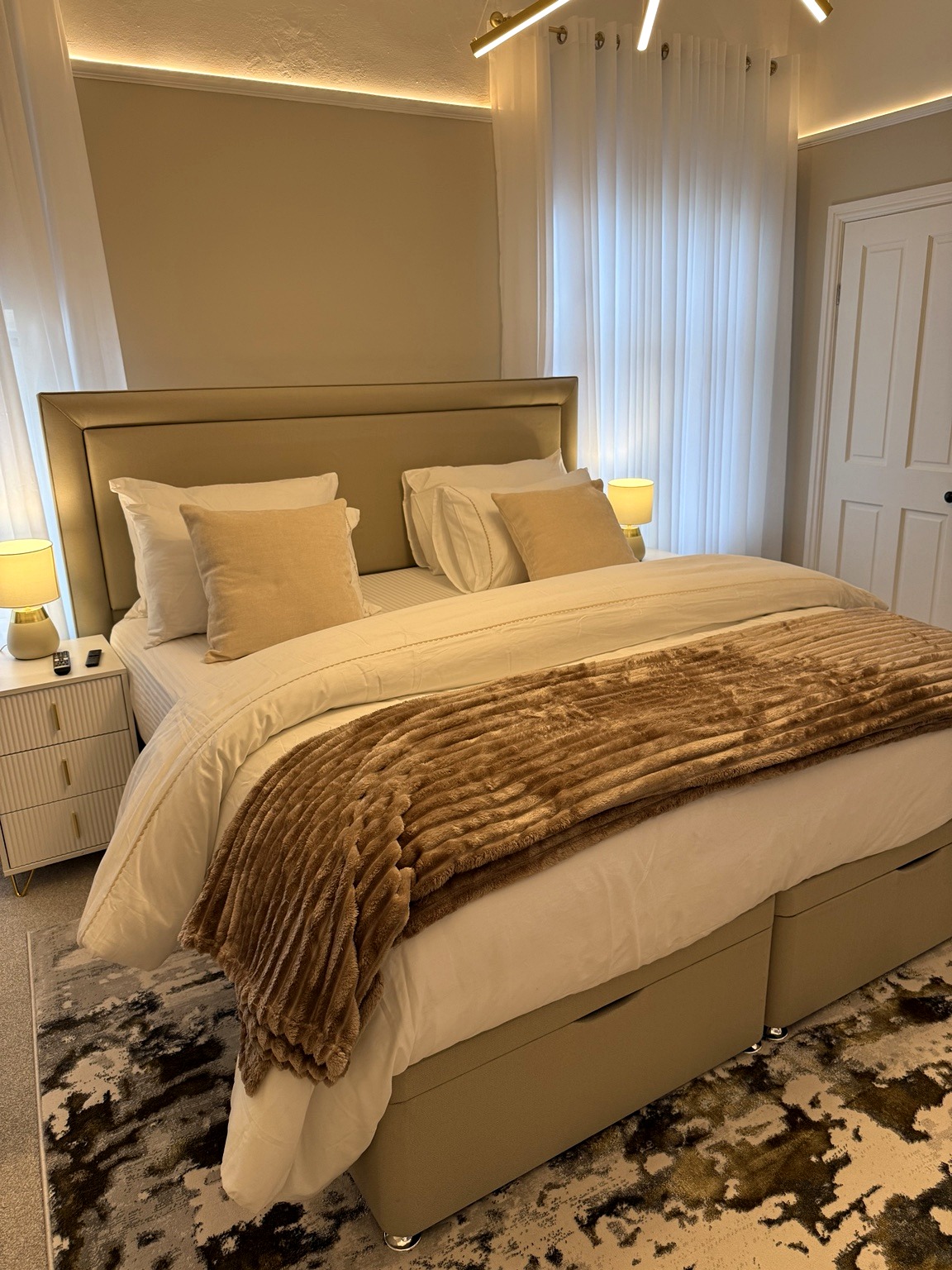 Bedroom mirror and fitted storage details